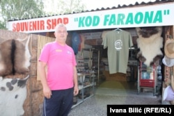 Nedzad Secerovic outside his "At The Pharaoh" souvenir shop in Visoko.