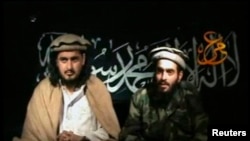 The late Pakistan Taliban leader Hakimullah Mehsud (left) sits beside a man who is believed to be the suicide bomber who killed CIA agents in 2009.