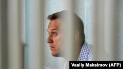 Russian opposition leader Aleksei Navalny attends a hearing at court in Moscow on June 24.