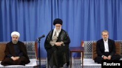 (R-L) Iran's parliament speaker Ali Larijani, Iran's Supreme Leader Ayatollah Ali Khamenei, and Iranian President Hassan Rouhani