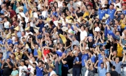 Kosovo fans cheer on their team in a match in Pristina in September 2019.