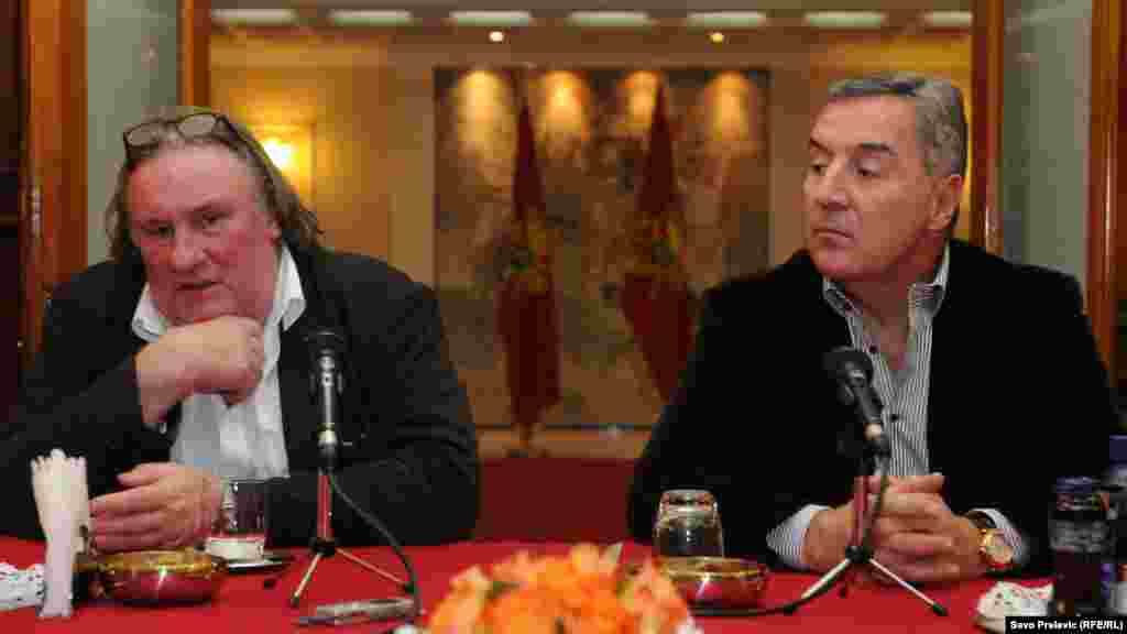 French actor Gerard Depardieu (left), who recently received a Russian passport from President Vladimir Putin, meets with Montenegrin Prime Minister Milo Djukanovic. Depardieu was in Montenegro to prepare for a film in which he plays the disgraced former head of the International Monetary Fund, Dominique Strauss-Kahn.