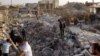 Пошукі загінулых пасьля налёту ўрадавай авіяцыі на горад Азаз (50 кілямэтраў ад Алепа), 15 жніўня, 2012