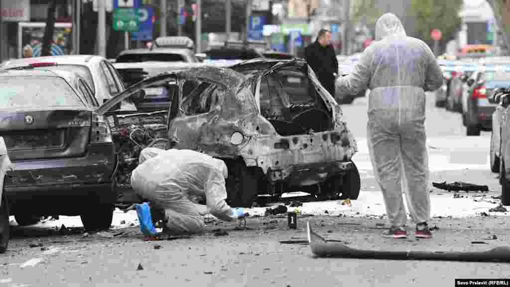 Experts investigate the site of a car-bomb explosion in Podgorica, Montenegro, February 3, 2019. (Savo Prelević, RFE/RL)
