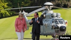 Francois Hollande i Angela Merkel 