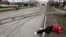 The body of a civilian killed during the Russian invasion lies in a street in the southern port city of Mariupol in April 2022.