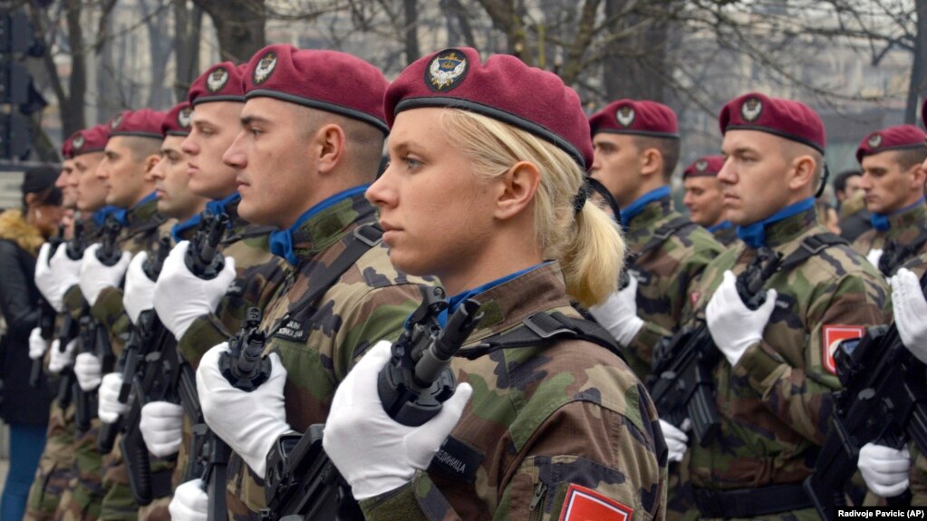 Members of the police forces of Republic of Srpska march during a parade marking the 26th anniversary of the Republic of Srpska in the Bosnian town of Banja Luka on January 9/ 