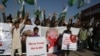 Supporters of Pakistani religious groups rally to condemn a tweet by U.S. President Donald Trump in Karachi on January 2.