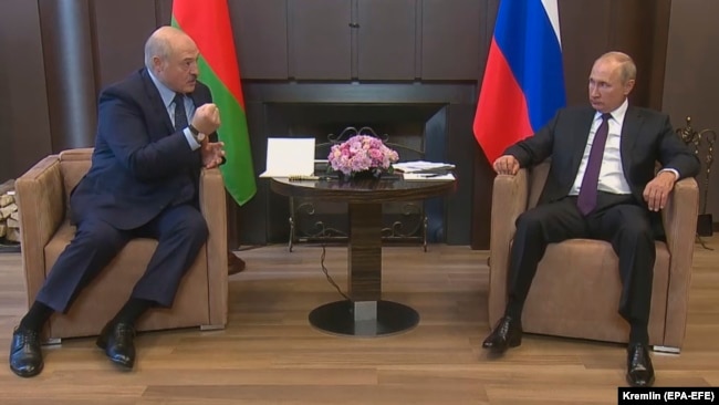 Belarusian President Alyaksandr Lukashenka meets with Russian President Vladimir Putin in the Black Sea resort of Sochi on September 14.