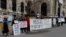 Anti-Ukraine-war protestors stand outside Vienna's Hofburg Palace during a Parliamentary Assembly of the OSCE this week. 