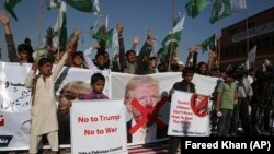 Supporters of Pakistani religious groups rally to condemn a tweet by U.S. President Donald Trump in Karachi on January 2.