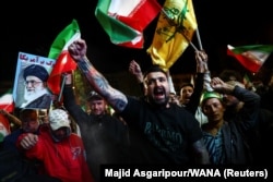 In Tehran, government supporters took to the streets after the two-week cease-fire deal was announced.