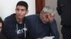 Armenia - Opposition activist Shant Harutiunian (R) and his son Shahen stand trial in Yerevan, 15Oct2014.