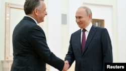 Stiv Uitkoff və Vladimir Putin