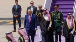 President Donald Trump (front left) walks with Saudi Crown Prince Muhammad bin Salman during an arrival ceremony at the Royal Terminal of King Khalid International Airport in Riyadh on May 13.
