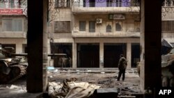 Razrušene zgrade u Aleppu