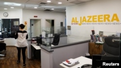 La biroul din Ierusalim al rețelei de televiziune Al-Jazeera 