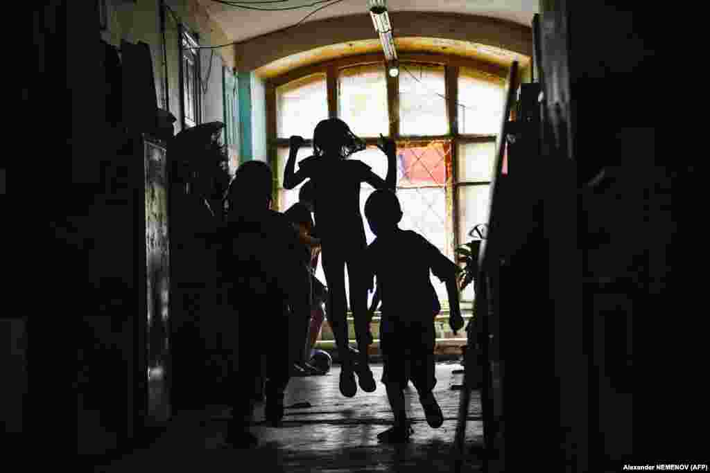 Children play in a dormitory of the Proletarka textile factory.&nbsp;Official statistics are patchy, but according to Housing Ministry figures reported by the newspaper Vedomosti, a third of Russia&#39;s housing will need major repairs by 2045.