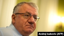 Serbian Radical Party leader Vojislav Seselj speaks during an interview with AFP in Belgrade on March 29.