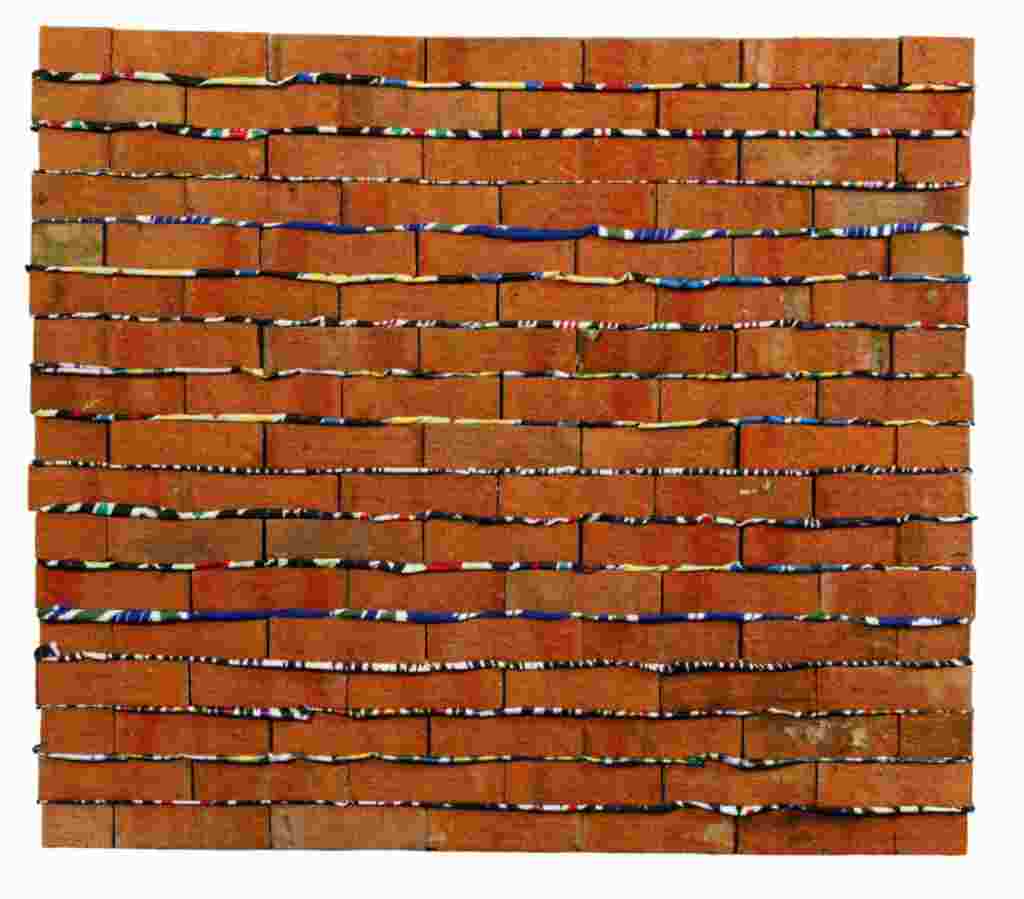 “The Wall,” a 2009 work by Tajik artist Aleksei Rumyantsev (b. 1975). The piece, composed of real bricks laid over layers of cloth “mortar,” is meant to represent the plight of Central Asian labor migrants, many of whom work construction jobs in Russia.
