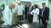 Sevastopol Governor Sergei Menyeilo (fourth from right) and the city's health department chief, Yury Voskanian (far right), attend the official opening of a new hospital operating theater on May 18. 