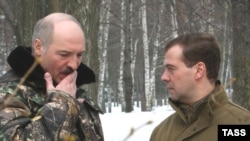 Lukashenka and Medvedev at a meeting in March