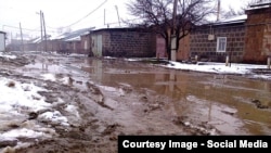 Armenia -- A muddy street in Gyumri.