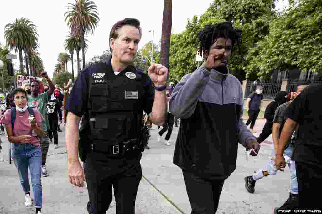 Поліцейський та протестувальник у Лос-Анджелесі