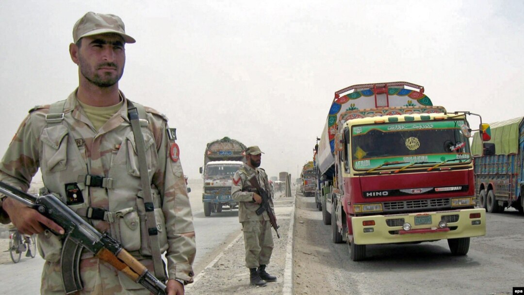 Pakistani soldiers patrol near the Afghan border.