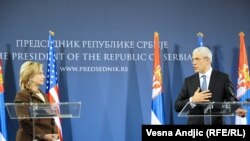 U.S. Secretary of State Hillary Clinton (left) with Serbian President Boris Tadic in Belgrade on October 12.