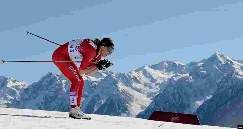 Eventual gold medalist Justyna Kowalczyk of Poland in action during the women's 10 kilometer classic competition at the Laura Cross Country Center. 