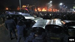 Armenia -- People clash with police during a mass protest outside the Russian Consulate General in the city of Gyumri, Armenia, 15 January 2015.