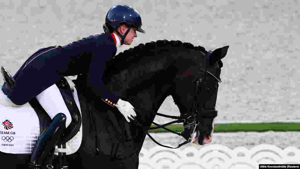 Charlotte Fry of Britain on her horse Everdale competes at Equestrian Park, Tokyo, Japan, July 24, 2021.
