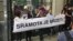 Serbia – Members of Youth Initiative for Human Rights Serbia are holding a banner "It is a shame to hate", as an reaction to protest of Serbian radical movements protest in front of the Center for Cultural Decontamination in Belgrade in which is held a fe