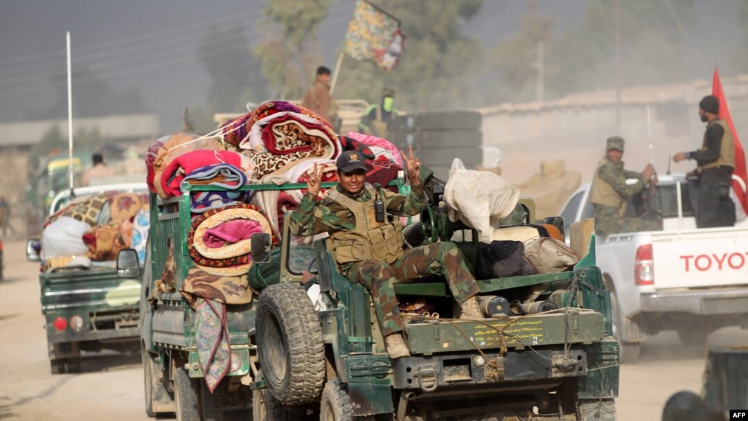 Shi'ite fighters from the Popular Mobilization forces have been taking part in the effort to recapture Mosul from Islamic State (file photo). 