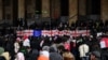 Protesters rally in front of parliament in Tbilisi on December 5, the eighth consecutive day of mass demonstrations against the government's postponement of EU accession talks until 2028.