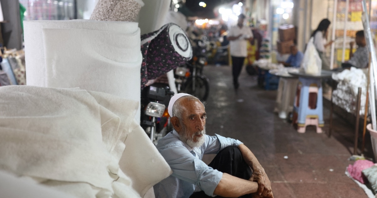 'Just To Survive': Soaring Inflation Puts Iranians' Lives On Hold