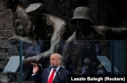 Trump speaks in front of the Warsaw Uprising Monument at Krasinski Square in Warsaw on July 6.