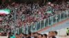 Iranian women cheer during the FIFIA World Cup qualification match between Iran and Cambodia, after FIFA pressured Iran to allow women enter Azadi stadium in Tehran, Iran October 10, 2019.