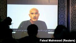 Kulbhushan Jadhav is seen on a screen during a news conference at the Ministry of Foreign Affairs in Islamabad in December 2017.