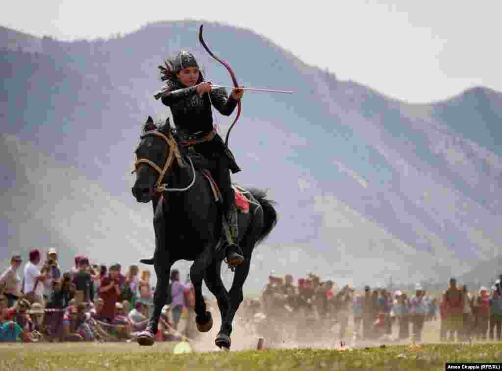 Turkey&#39;s Janset Genel in full flight during the mounted archery event, which the 18-year-old would go on to win.