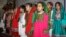 Afghan children singing the national anthem at an event for World Children's Day. Under the new ban by the Education Ministry, schoolgirls over a certain age will only be permitted to sing at public events if all participants are female. (file photo)