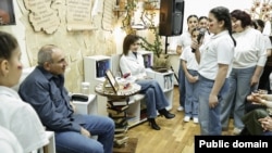 Armenia - Prime Minister Nikol Pashinian and his wife Anna Hakobian attend a public discussion of his book in Artashat, February 14, 2026.