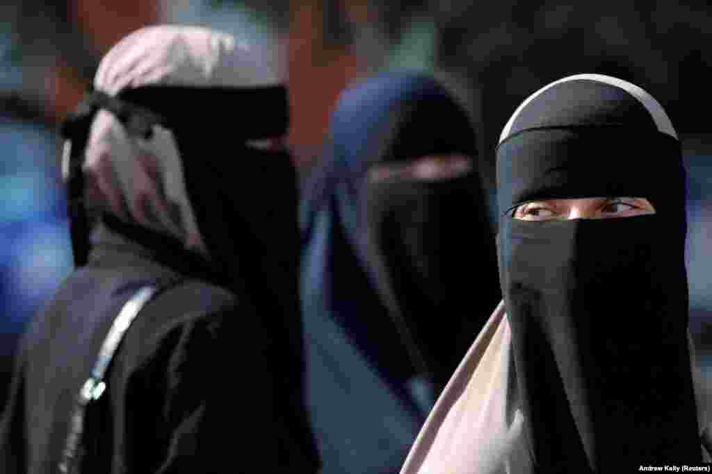 Women in niqabs gather before a demonstration against the Danish face veil ban in Copenhagen. (Reuters/Andrew Kelly)