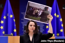Belarusian opposition leader Svyatlana Tsikhanouskaya delivers a speech as she receives the 2020 Sakharov Prize at the European Parliament in Brussels on December 16.