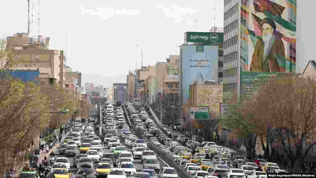 Long lines formed at gas stations and many Iranians began heading out of cities in search of safety, witnesses told Reuters.