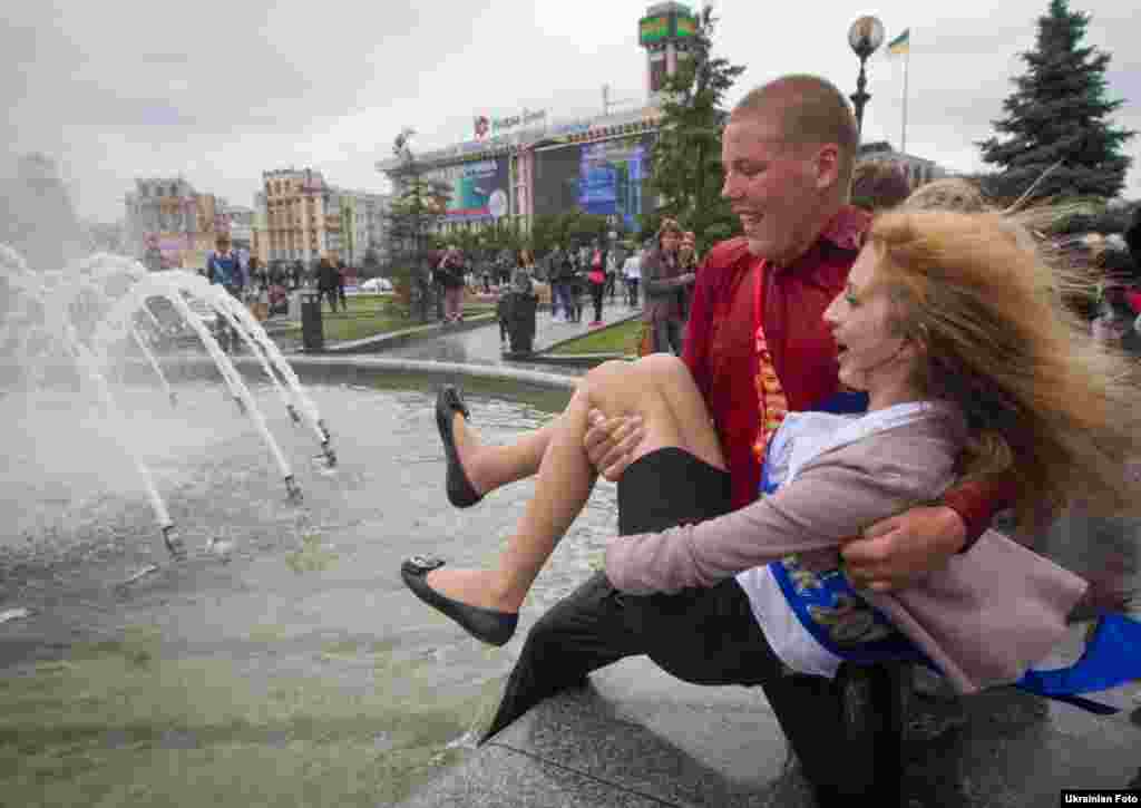 Ukrainian school-leavers indulge in some typical "last bell" festivities marking the last day of school in Russia and several other post-Soviet countries. (RFE/RL)
