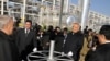 The presidents of (from left) Kazakhstan, Turkmenistan, Uzbekistan, and China attend an opening ceremony at a gas production facility in Turkmenistan. The OECD says supplying growing economies in Russia, China, and India is both blessing and curse.