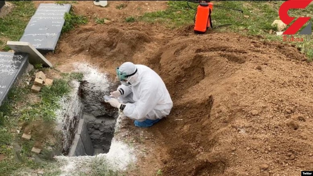 A grave dusted with quicklime for disinfection against coronavirus in Mazandaran, Iran. April 7, 2020.