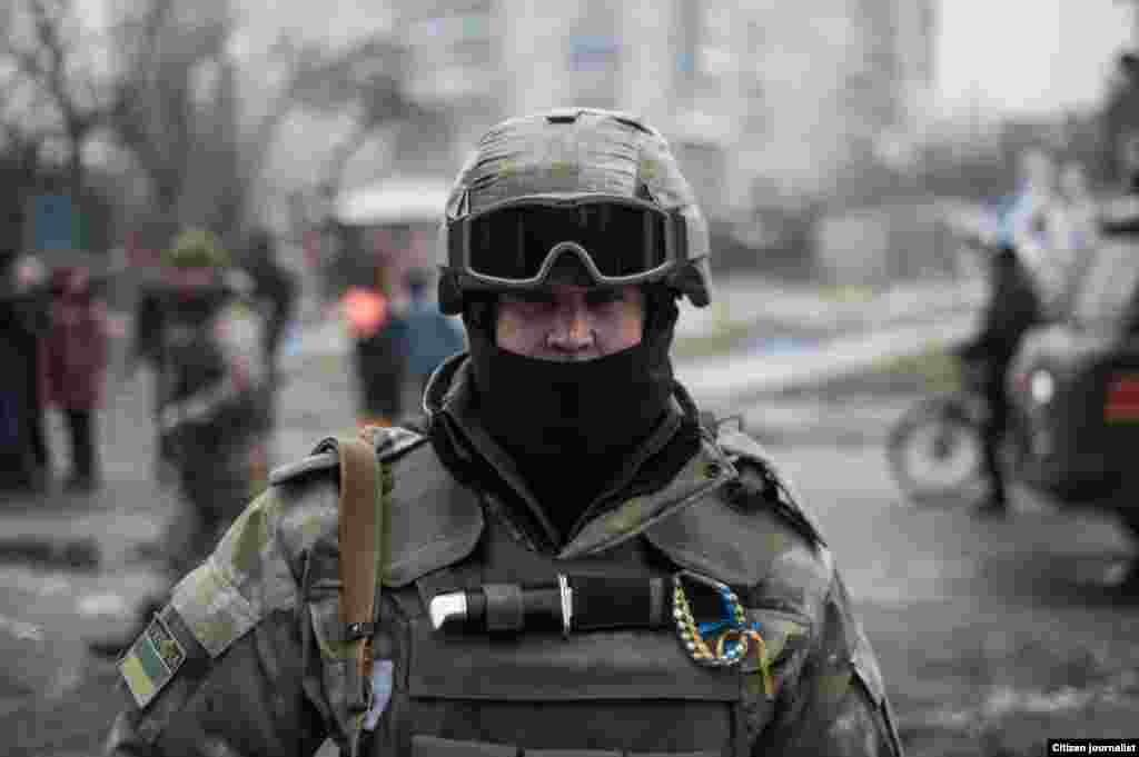 Debaltsevo township, Donetsk region, Ukrain. The territory is under ukranian control. The center of distribution of humanitarian aid in a former city hall. The ukrainian soldier.